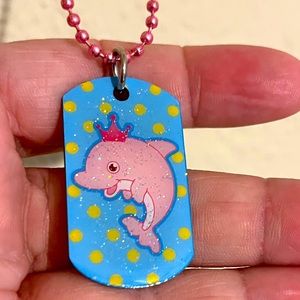 NWT Seaworld Dolphin Necklace.